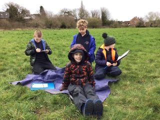 Year 4 enjoying their forest school this morning searching for signs of Spring!